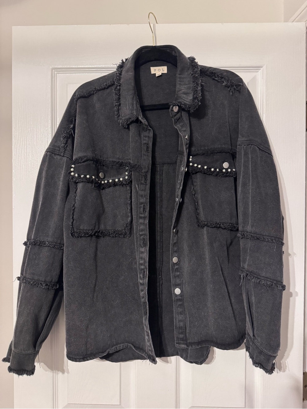 Black denim jacket with detail